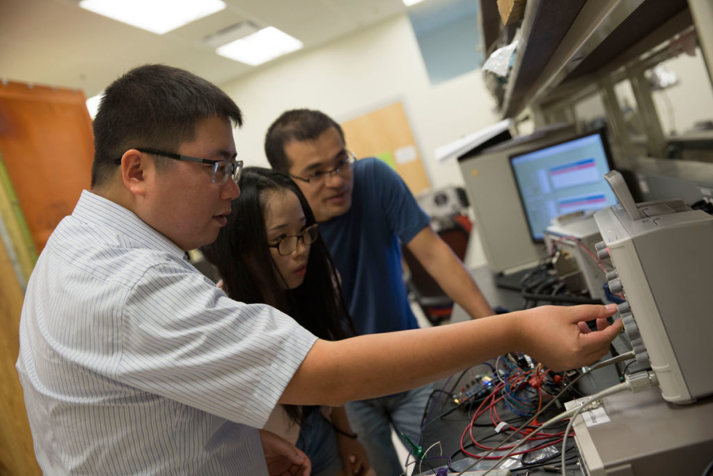 Assistant Professor Shimeng Yu (left) was recently awarded a National Science Foundation CAREER Award for his work related to neuro-inspired computing. He brings his expertise in higher-level computing architectures to help the team design neuromorphic architectures to test under various types and levels of radiation. 