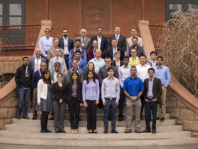 A group of people gather on the steps of a stately, old building known as Old Main on Arizona State University's Tempe campus for a group photo. The group consists of researchers and stakeholders involved in the Center for 4D Materials Science, or 4DMS, a new research center devoted to materials science and engineering at the Ira A. Fulton Schools of Engineering. Photographer: Marco-Alexis Chaira/ASU