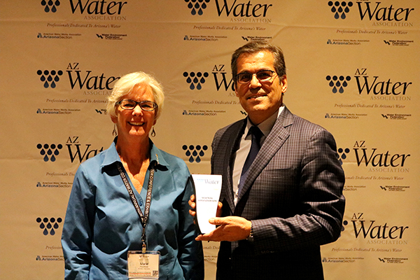 Photo of Morteza Abbaszadegan holding the award next to Marie Pearthree with a caption of Professor Morteza Abbaszadegan accepts his Nathan Burbank Environmental Educator of the Year Award from AZ Water Association President Marie Pearthree, May 4, 2017 at the Association's annual awards reception. Photographer: Robert A. Goff/AZ Water Association  