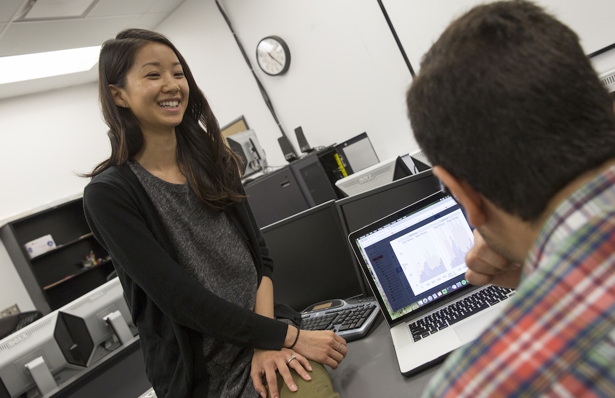 Professor talking to student
