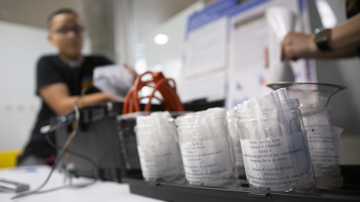 plastic bottles with coffee filters in them