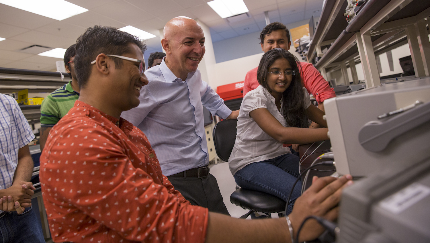 professor and students in lab