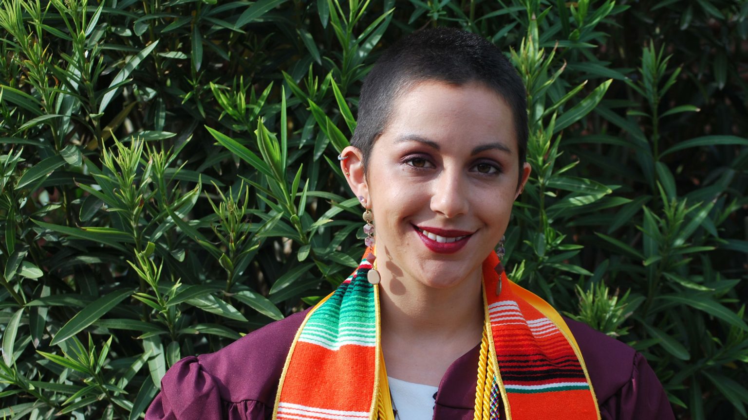 Nicole-Haikalis-w-1536x864 Biomedical engineering and neuroscience graduate Nicole Haikalis in her graduation attire.