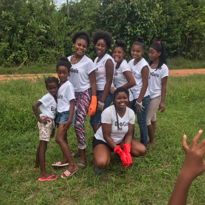 Shakira Hobbs poses with Sittee River Village community members