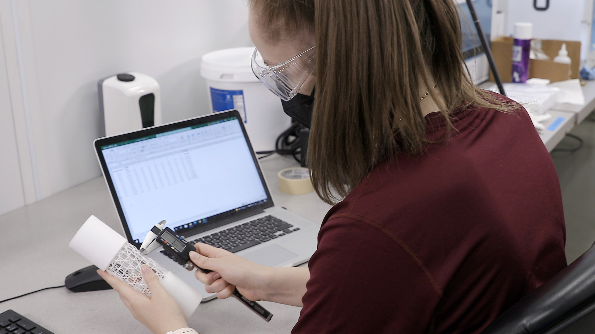 student working with a 3D manufactured item