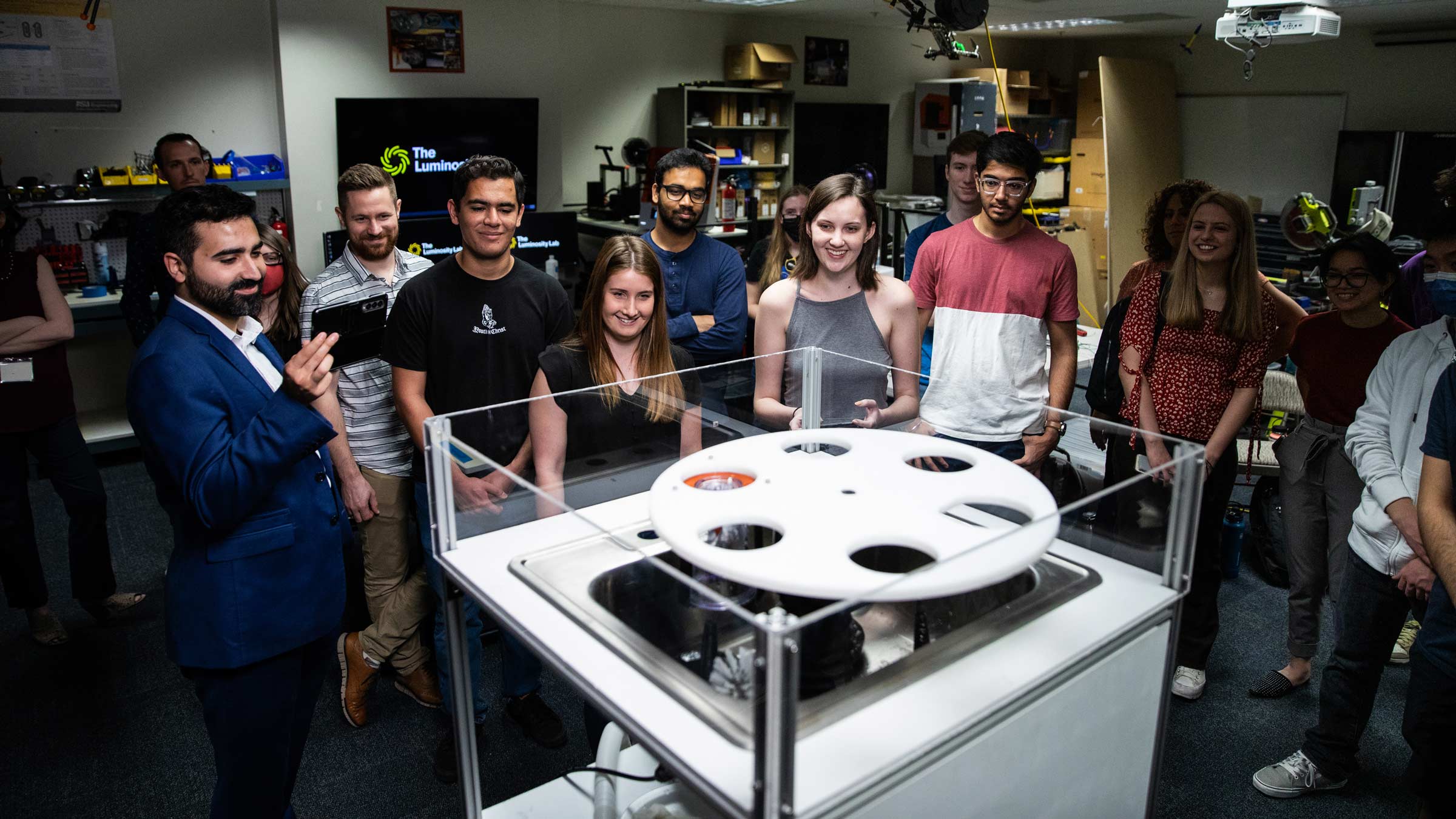 20220316LuminosityLab_173w a group of students gathered at ASU's Luminosity Lab