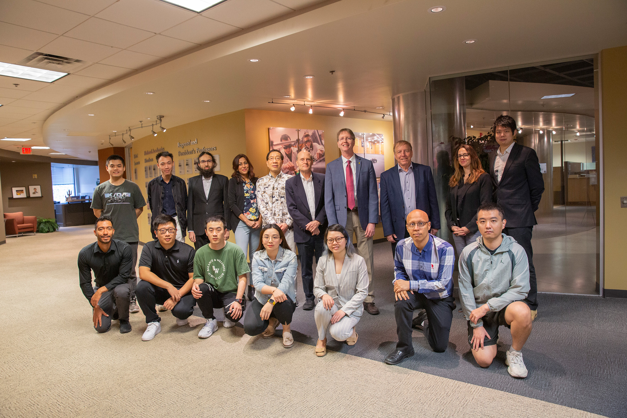 A group of people involved in the ICRDE partnership poses for a photo