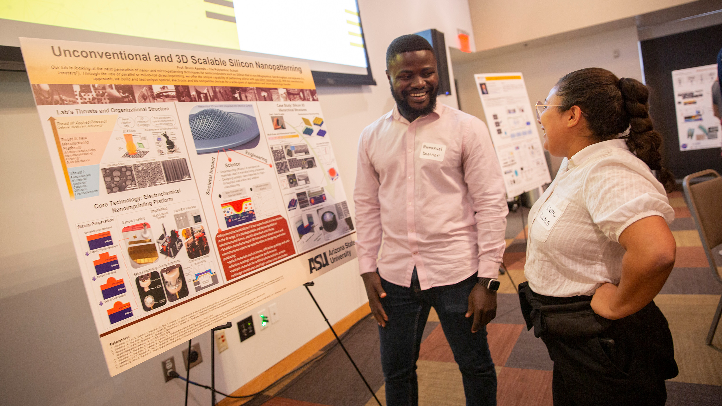 Emmanuel Dasinor and Laura Duenas Gonzalez at the School of Manufacturing Systems and Networks open house