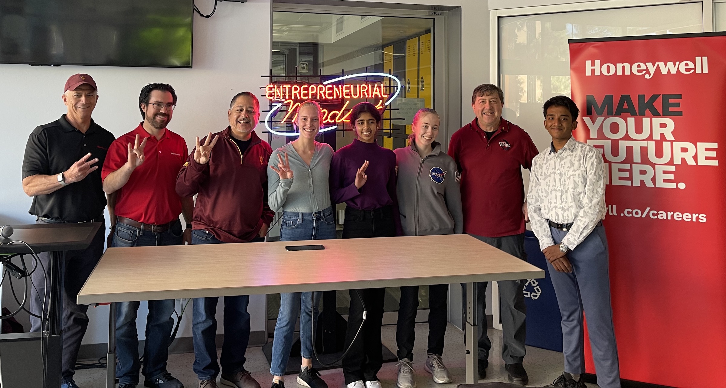 The four members of Houston team that won second place at Devils Invent: Aerospace Sustainability with industry members from Honeywell