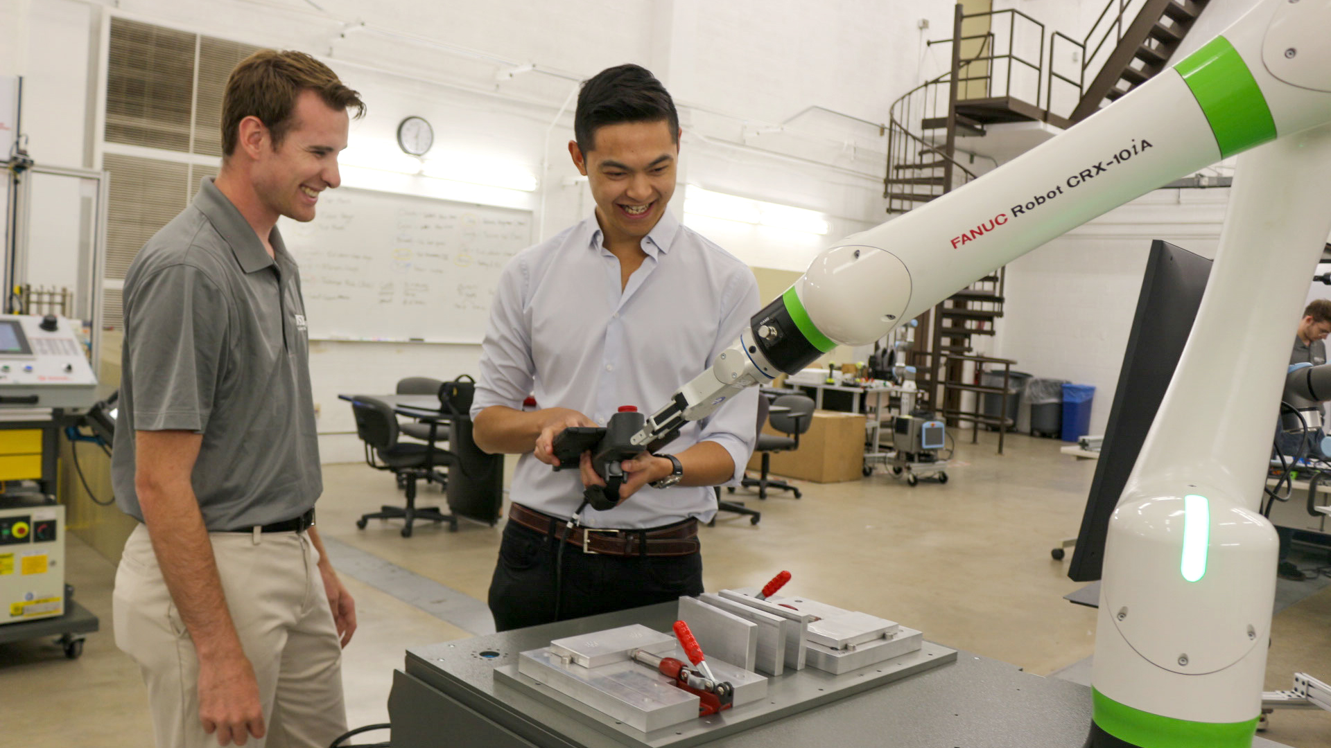 MSN-Robotics-Equipment-SIM-SP2023-SS-7862-a-16×9-2500w Ammon Hall and student operating a robot