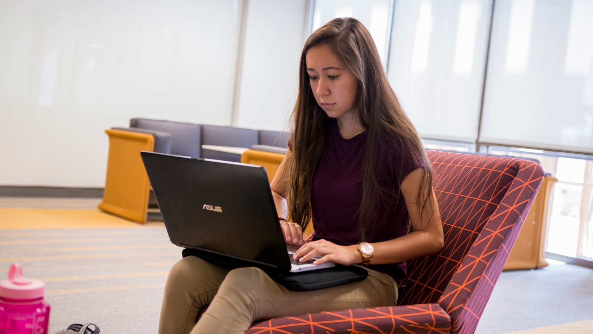 student using laptop computer