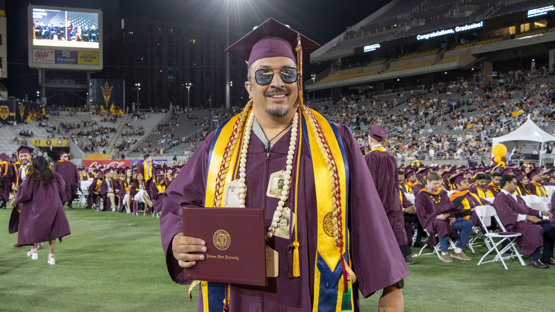 ASU graduate Michael D’Saachs poses at the Fulton Schools Spring 2023 Convocation ceremony.