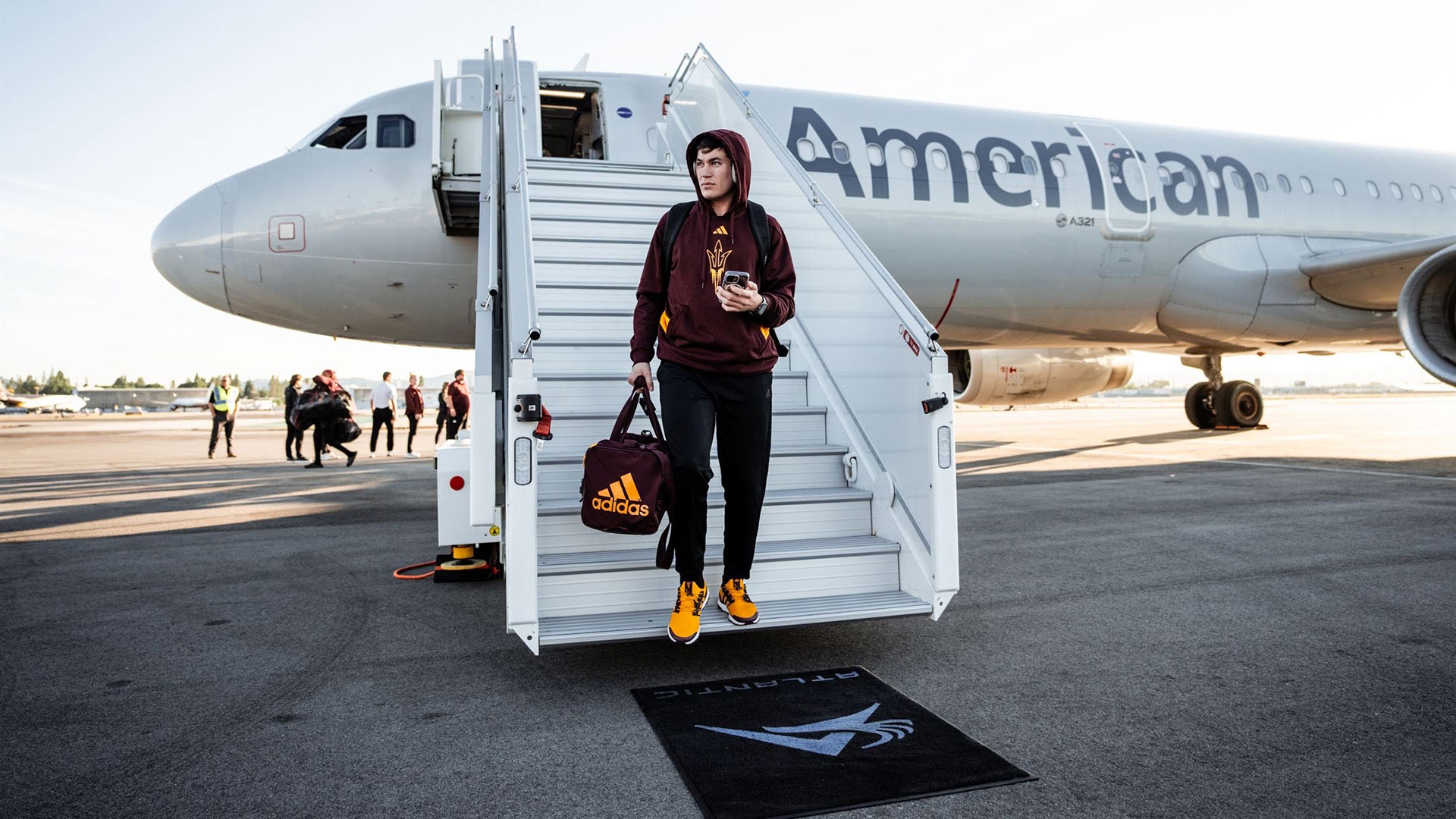 Coben Bourguet getting off a plane