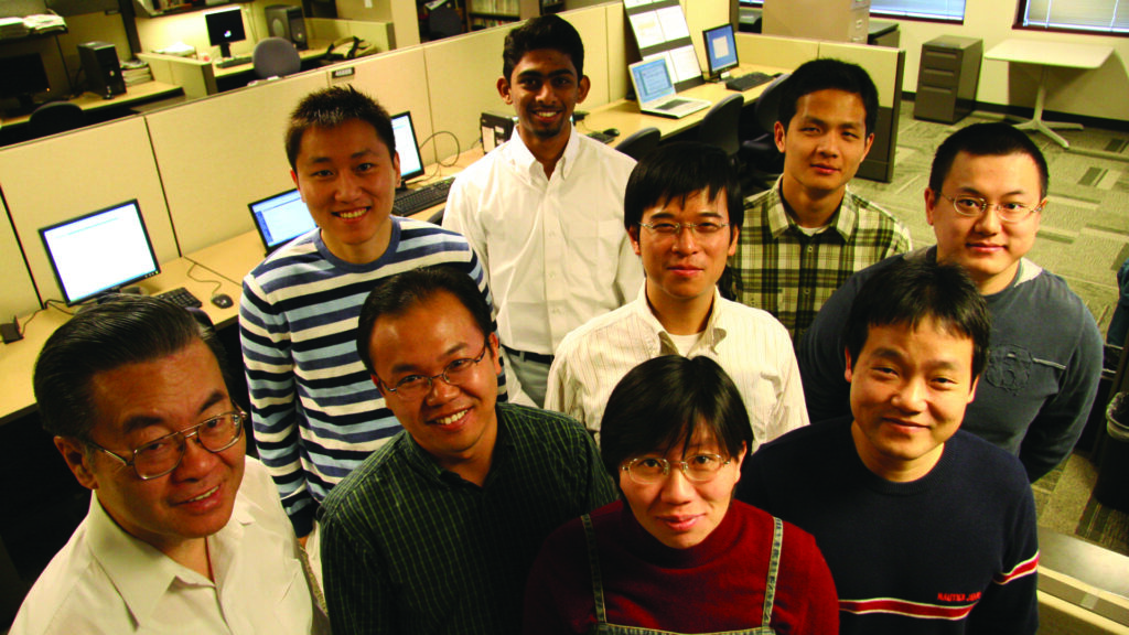 Yau poses with doctoral students in 2007