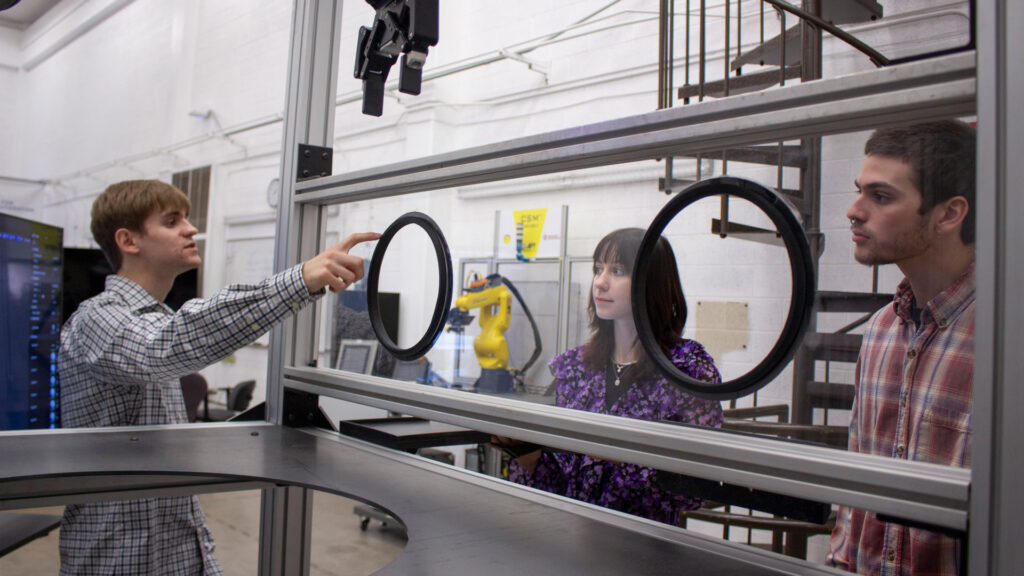 students in the Industrial Automation and Robotic Systems Laboratory