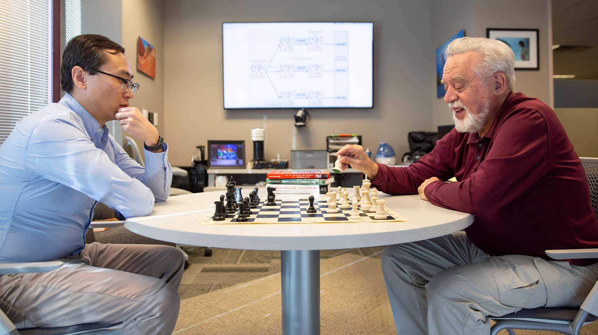 SCAI-Dimitri-Bertsekas-Yuchao-Li-2025-EG-7418-a_REVDB Yuchao Li and Dimitri Bertsekas play chess.